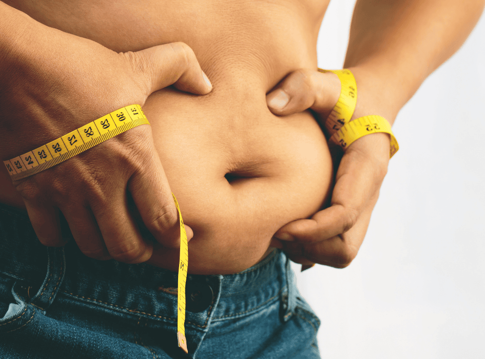 muž si drží tukové brucho a meter-alt
