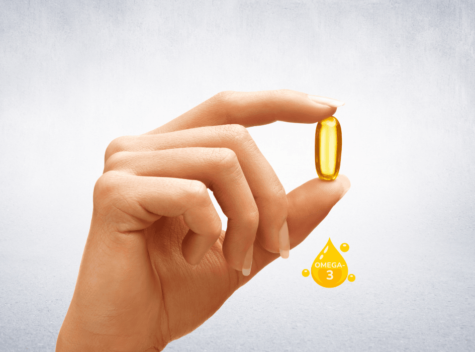 omega 3 olejová kapsula, ktorú drží ruka-alt